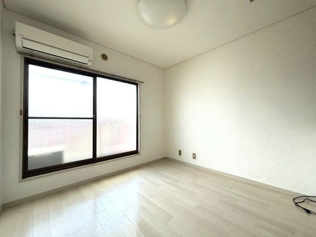 ロイヤルハイツ川西の寝室