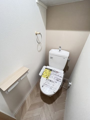 大阪市旭区生江１丁目の賃貸マンションのトイレ