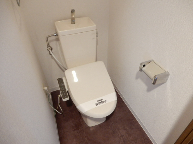 明石市小久保１丁目の賃貸マンションのトイレ