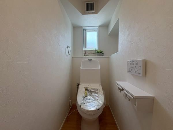 海南市つつじヶ丘27-5号　新築戸建のトイレ