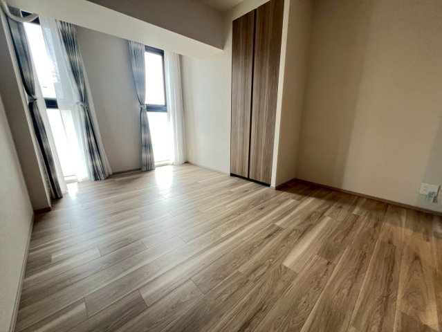 グランカサーレ西明石駅前の寝室