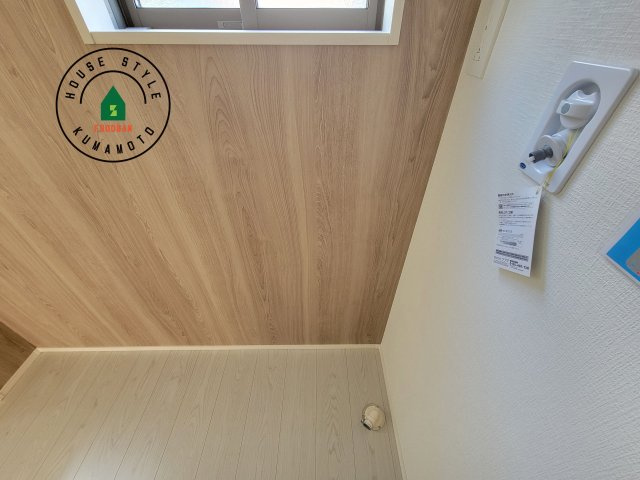 熊本市東区東京塚町第1-2棟（1号棟）　の内観：施工例|ランドリースペースとなります。広々して有効的にご使用できます。 