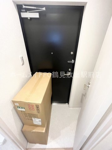 大阪市城東区東中浜８丁目の賃貸マンションの玄関