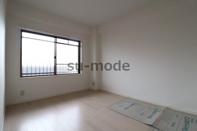 サンライズ春日丘の洋室