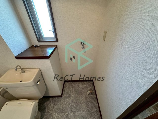 南駅前マンションの洗面所