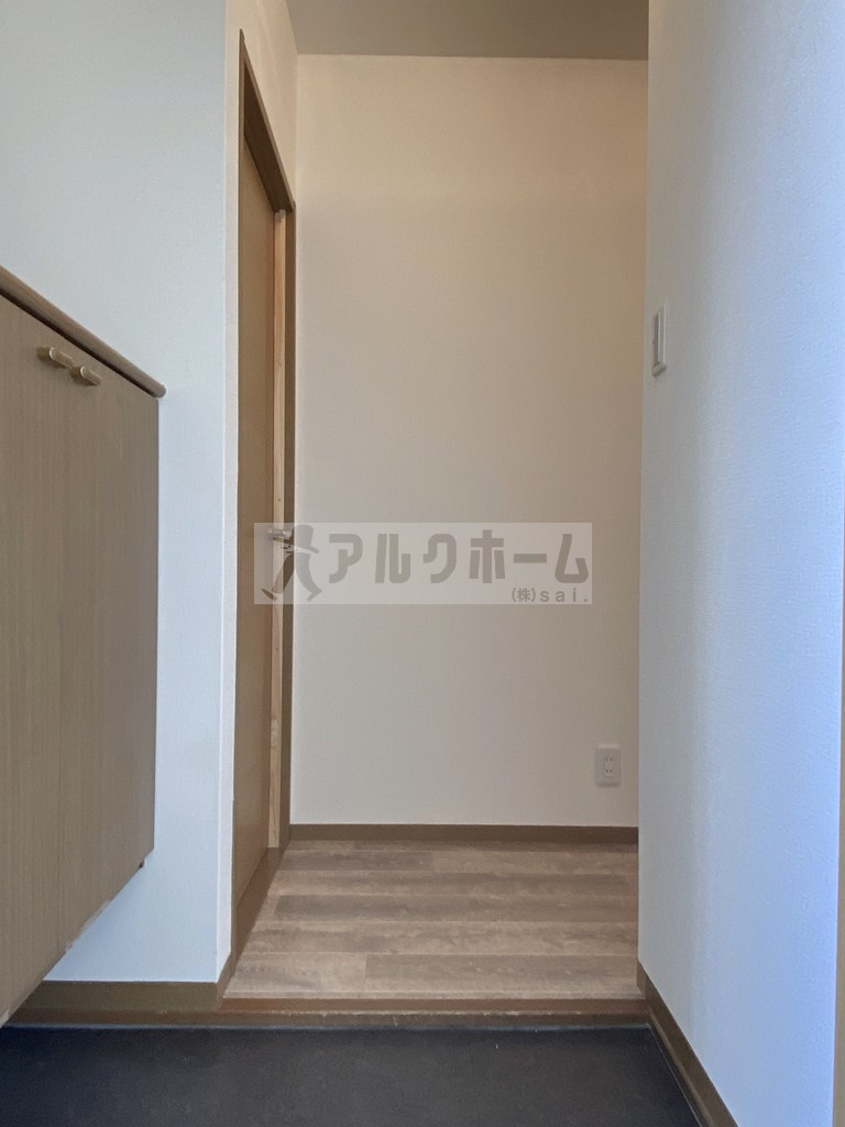 ニューリバーサイド八尾南D棟の玄関