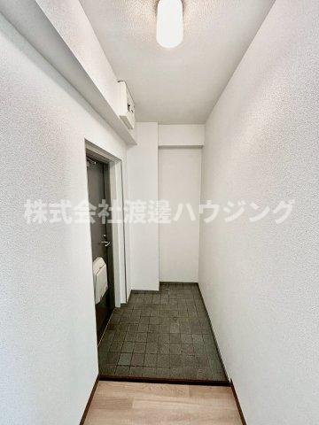 メゾンチサトの玄関