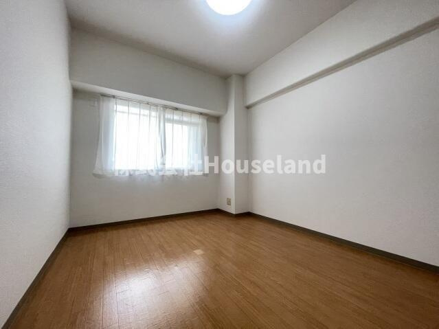 サンライズマンション岩出Ⅱの洋室