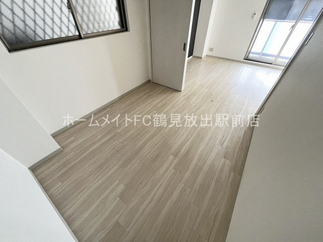 大阪市城東区永田４丁目の賃貸マンションの洋室