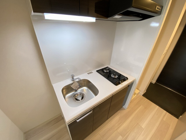 神戸市兵庫区大開通３丁目の賃貸マンションのキッチン|システムキッチン（ガス２口）