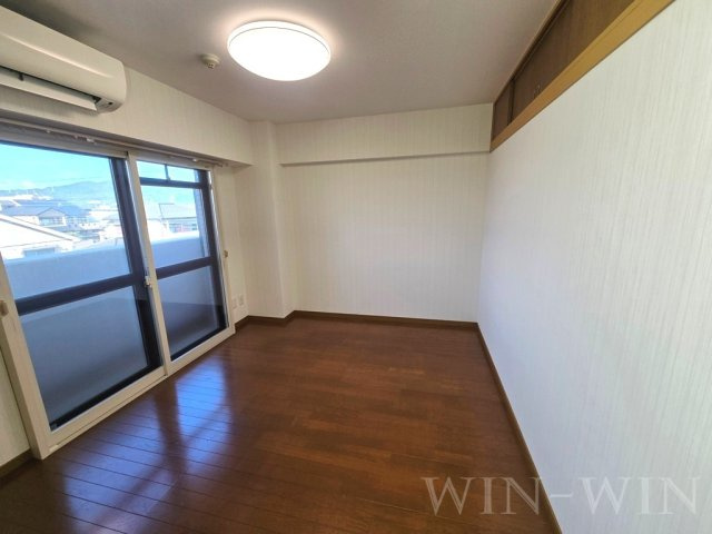 春日グリーンフラッツの寝室