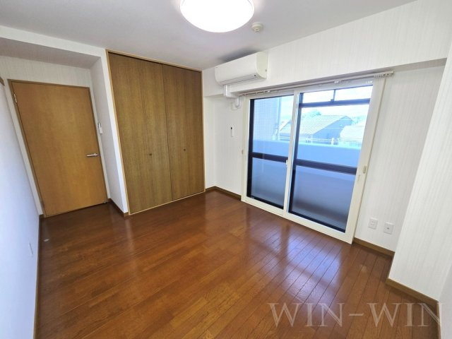 春日グリーンフラッツの洋室