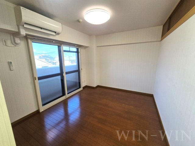 春日グリーンフラッツの寝室