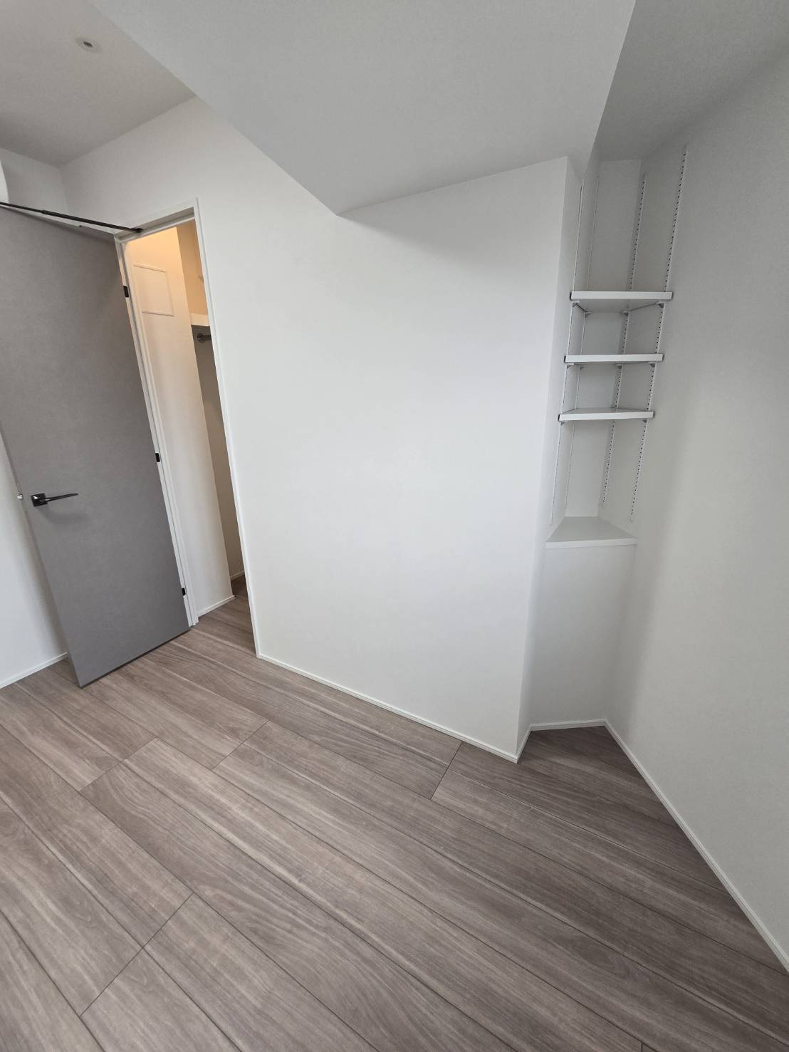 オープンブルーム入谷Eastの寝室