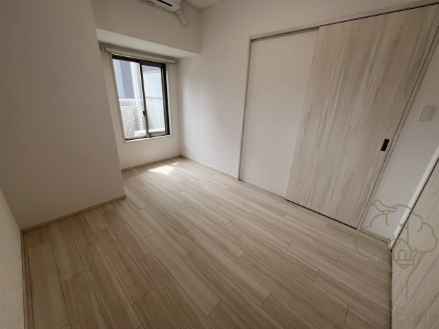 プレジオ都島ASIAN の寝室