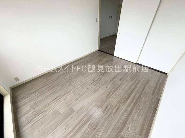 大阪市鶴見区諸口６丁目の賃貸マンションの洋室