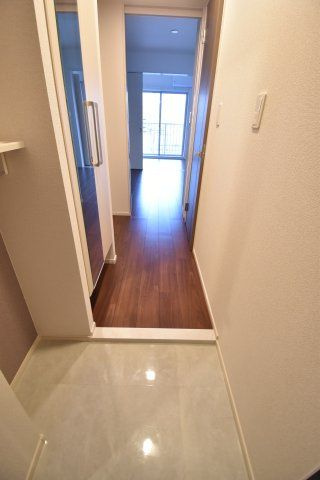 リアライズ長居公園通の玄関