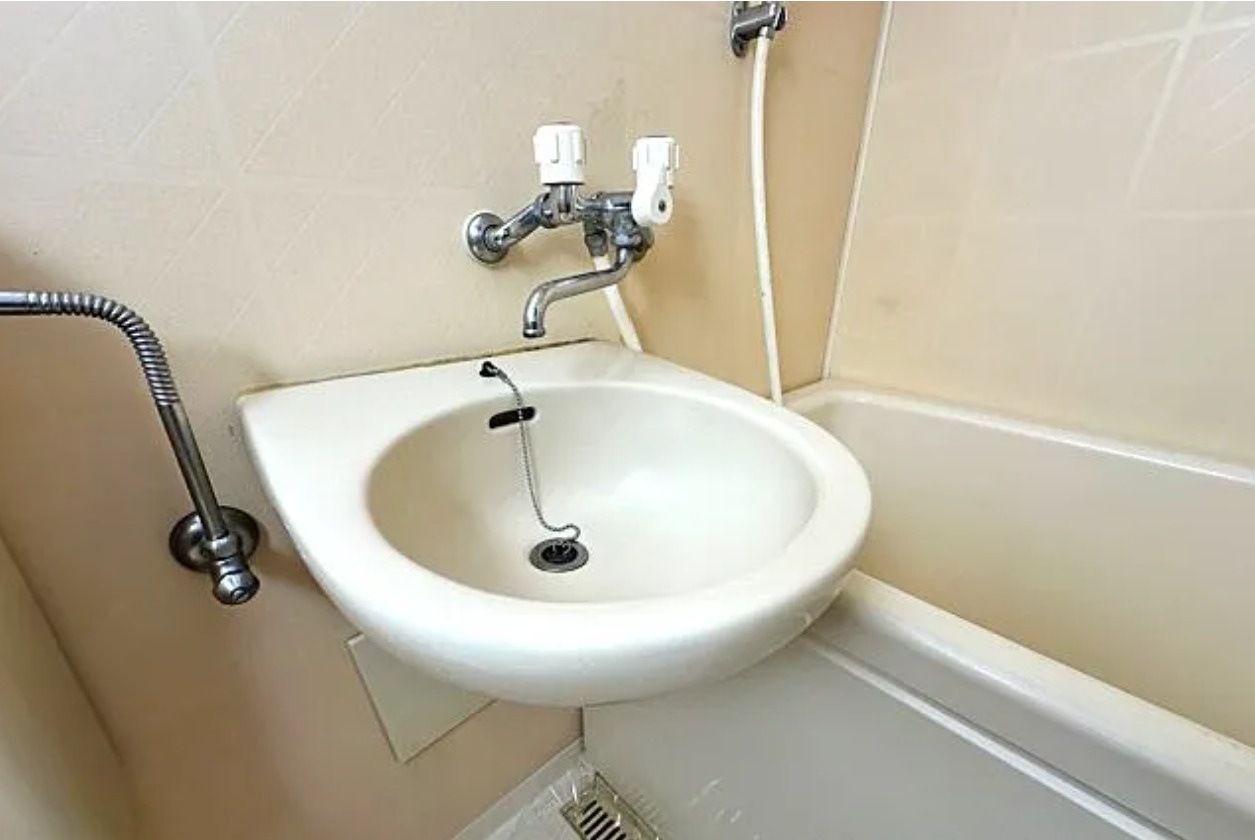 豊橋市東田仲の町　収益アパートの洗面所