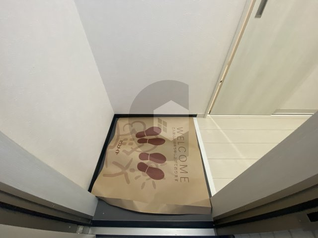 SMILEハイツ鴻池の玄関