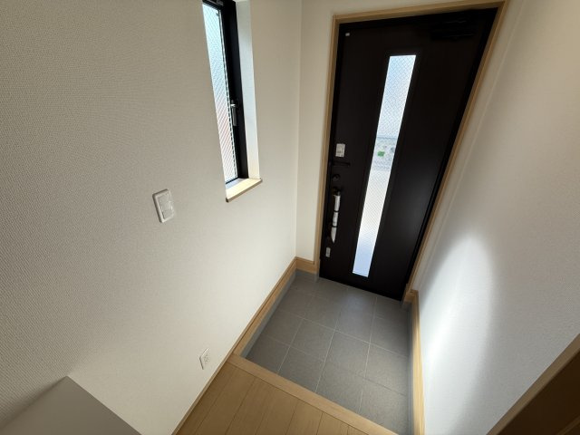 堺市西区上　全1棟の玄関