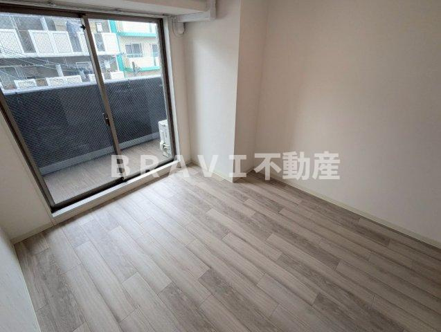 プレサンスOSAKA東中本エシデル BRAVI不動産の洋室