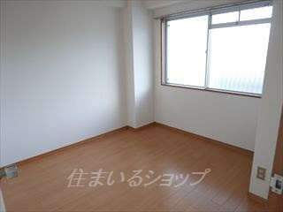 広島市安佐北区落合２丁目の賃貸マンションの寝室