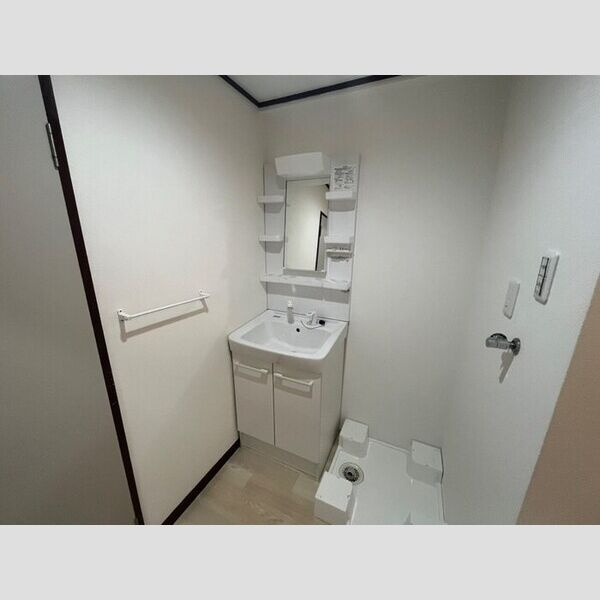 神戸市垂水区学が丘４丁目の賃貸マンションの洗面所