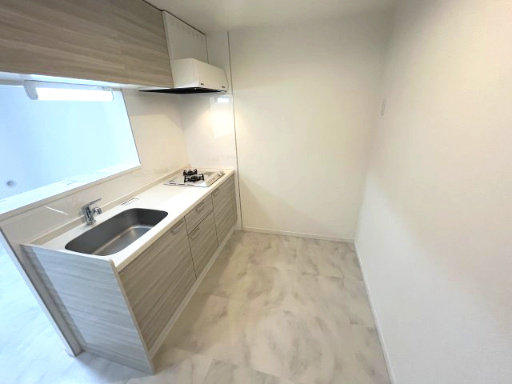 エスグランデ中崎町のキッチン|同マンション反転タイプの間取り写真