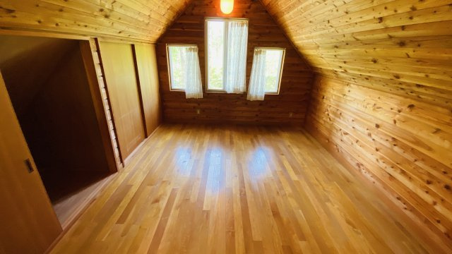 浅間ハイランドパーク ロフト付きの1LDK 中古戸建の洋室