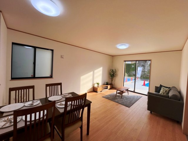 ハートフルタウン沖縄市南桃原　A号棟の居間・リビング|LDK17帖