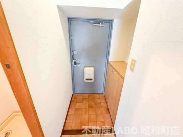  ラウンド東田辺の玄関