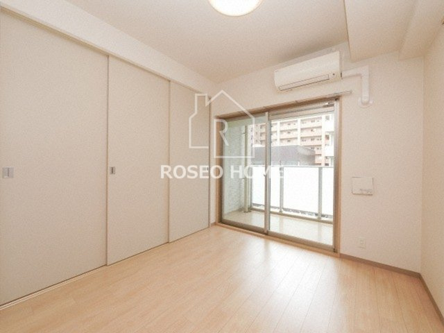 ネットフローラ立売堀の洋室