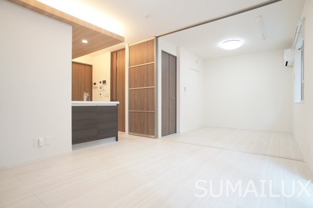 熊本市南区御幸笛田１丁目のアパートの居間・リビング