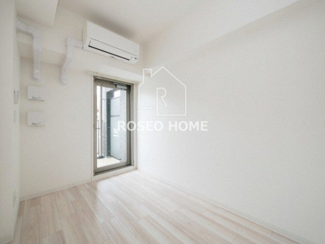 ラドゥセール谷町の洋室