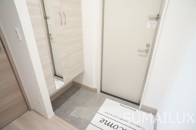 アクアフェリーチェA棟の玄関