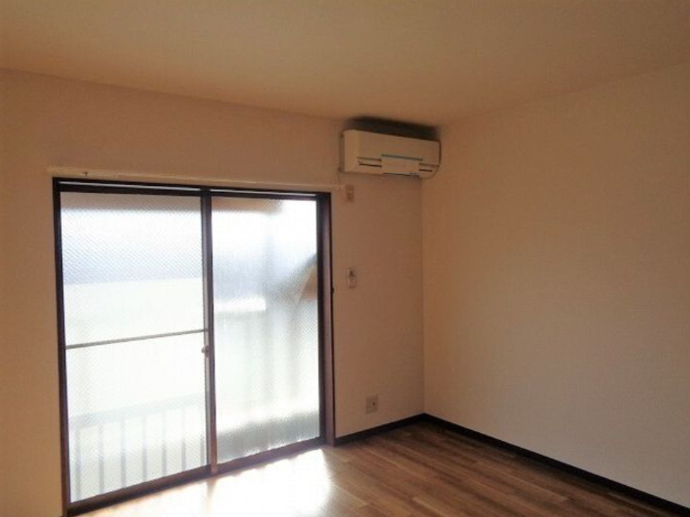 富山市西中野町2丁目　一棟売マンションの洋室