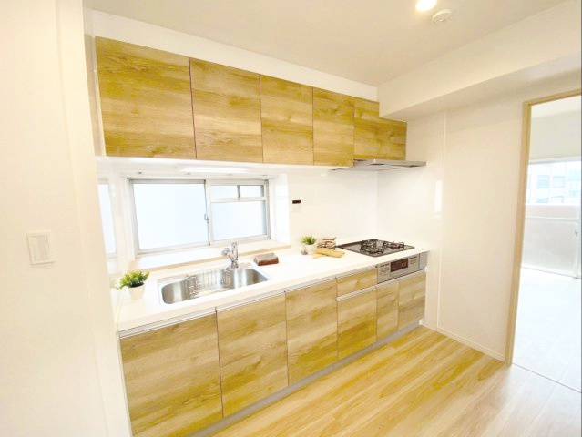 三愛シティライフ箱崎12のキッチン|木目調が空間になじむ、温かみのあるキッチンです！