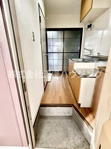 メルベイユ千里山北棟の玄関