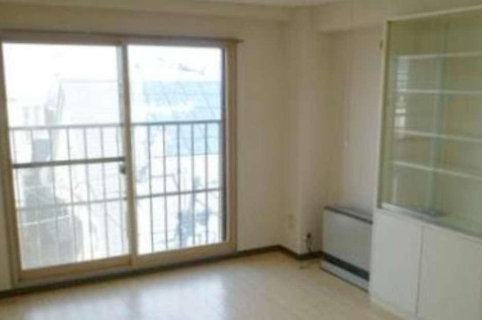 札幌市西区八軒九条西1丁目　一棟売マンションの洋室