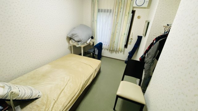 浅間ハイランドパーク プルミエールA棟1階 2LDKの洋室