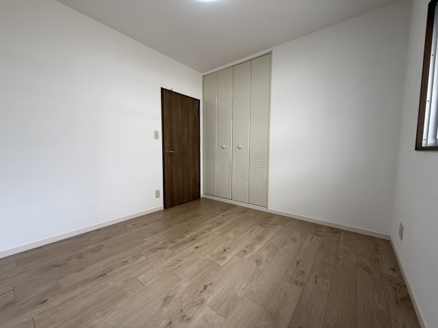 コンフォール学園緑が丘第2　弐七号棟の洋室