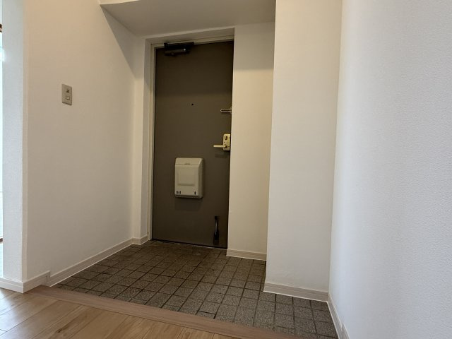 コンフォール学園緑が丘第2　弐七号棟の玄関