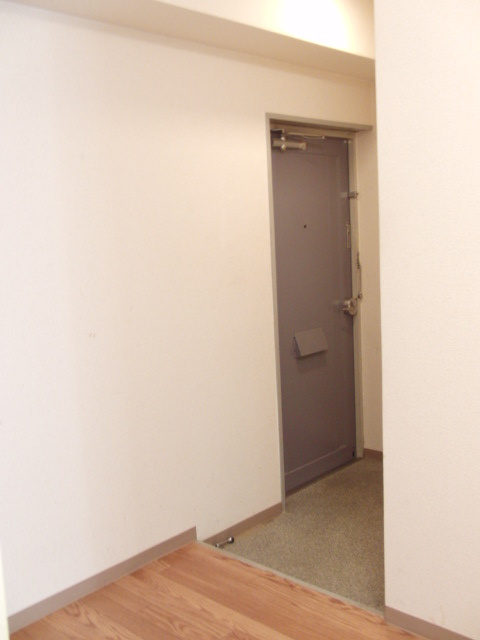 大阪市淀川区十三元今里１丁目の賃貸マンションの玄関
