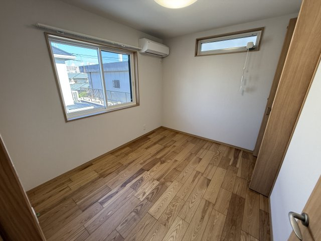 上野東ローズAの寝室