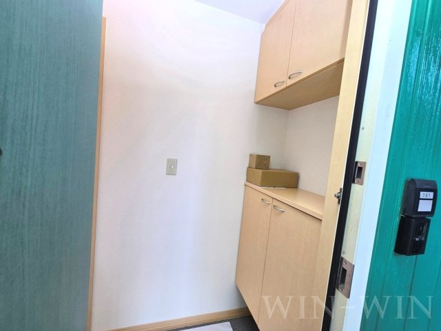 ヴィラージュルピナ B棟の玄関