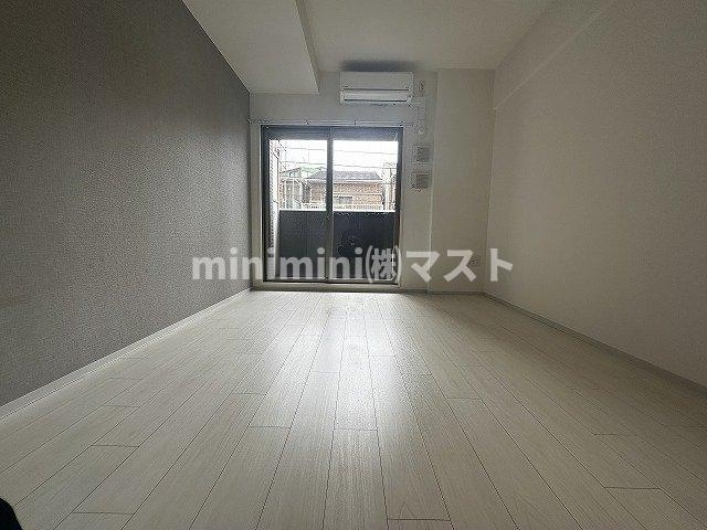 大阪市西区本田２丁目の賃貸マンションの居間・リビング