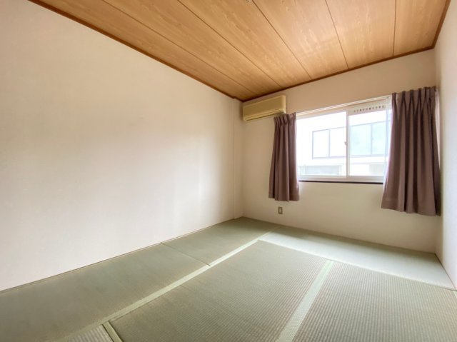 プラザ朝霧の寝室