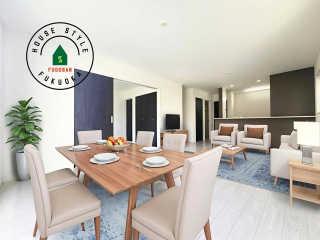 糟屋郡宇美町とびたけ1丁目第1-2棟（1号棟）の内観：施工例|キッチンからリビングをしっかり確認できます。家族の笑顔があふれる空間になりそうですね。※家具はCGを合成したものです。