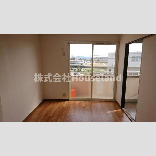 ヤマイチＰＬＡＺＡサニータウン園部の居間・リビング