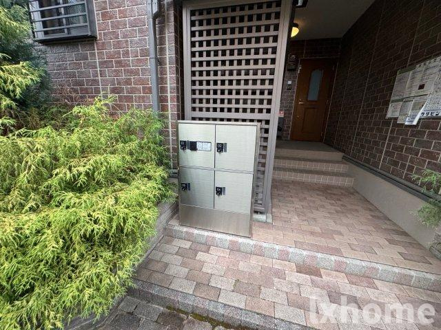 アウラ千里丘のエントランス|建物の内部です